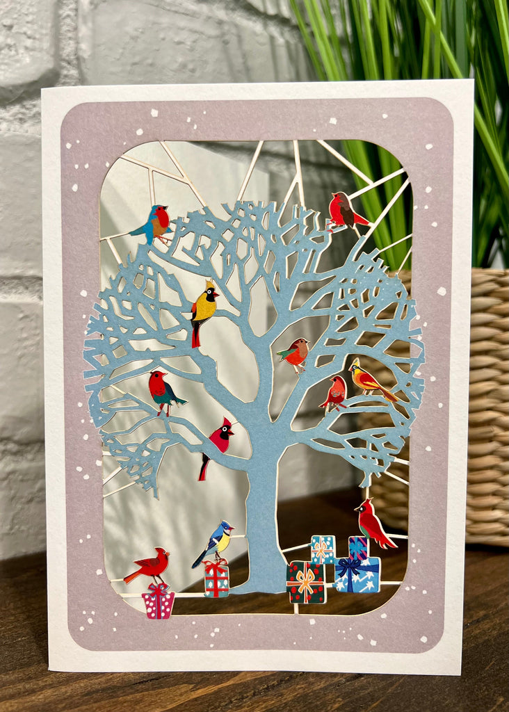RXP87 Birds in tree with Christmas presents