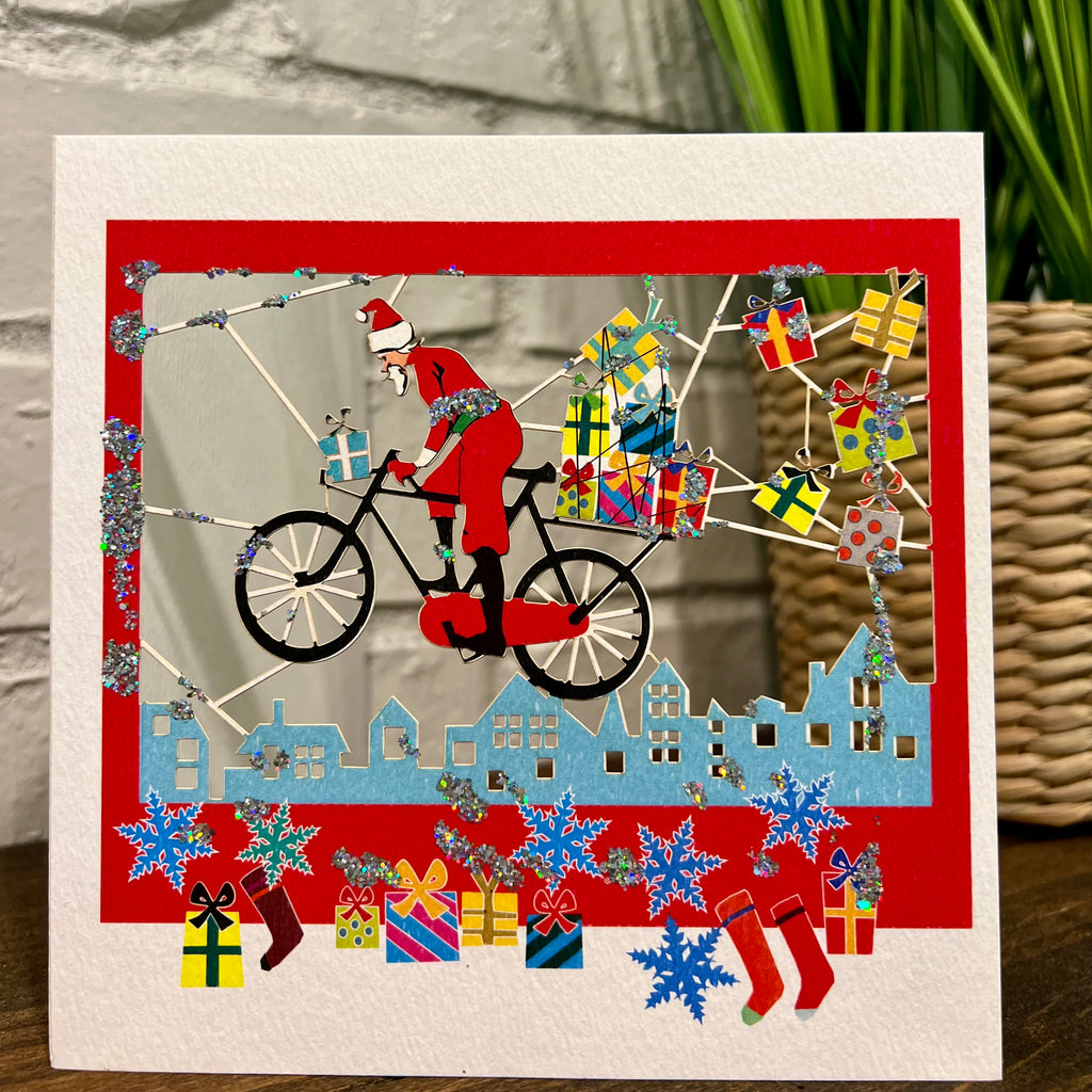 RXPM46 Santa pedaling presents
