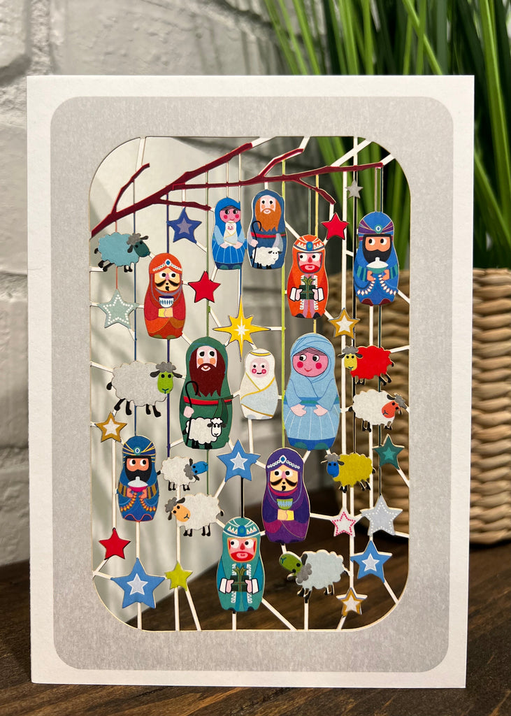 RXP88 Christmas Nesting doll ornaments in tree